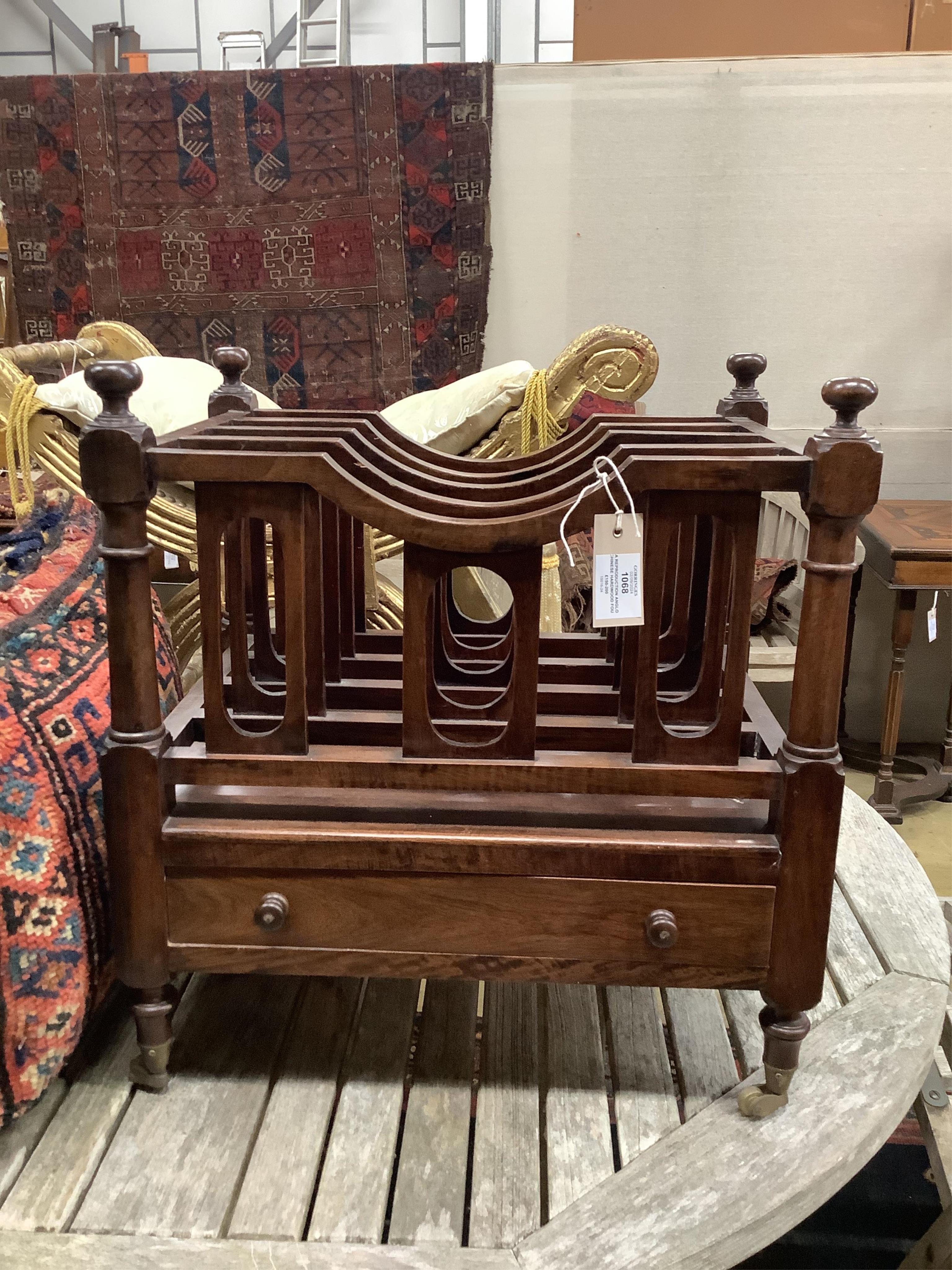 A reproduction Anglo Chinese hardwood four division Canterbury, width 48cm, depth 35cm, height 52cm. Condition - fair